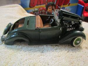 lot 129 image: 1936 ford franklin model car missing a wheel and a few other small pieces