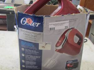 lot 35 image: Oster hand mixer