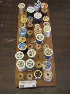 lot 86 image: Sewing Thread  in every color on a spindle  - some older wooden spools