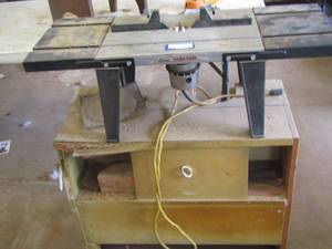 lot 92 image: craftsman table with a sears router screwed to a table top