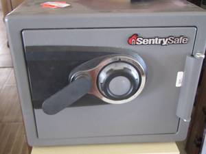 lot 193 image: Sentry  safe comes with combo, like new