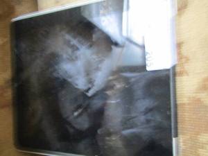 lot 205 image: apple I pad, no charger so unsure if it works