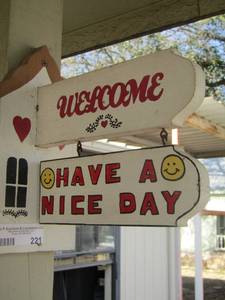 lot 221 image: welcome have a nice day sign, BRING SCREW DRIVER TO REMOVE- PHILLIPS