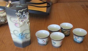 lot 237 image: SAKE DRAGONWARE BOTTLE , SINGING BIRD DECANTOR WITH SAKE CUPS