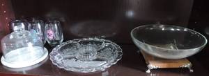 lot 10 image: Mixed lot cheese ball dish three wine glasses with sugar skullsCrystal relish trayglass bowl with wood base