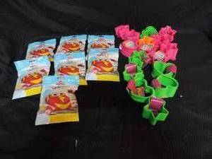 lot 15 image: Mixed lot Play-Doh Air clay heart and star shape slinkys