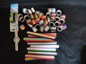 lot 17 image: Lot of slap bracelets and a few pop bracelets around 50 in all