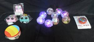 lot 20 image: Lot of kids light up balls wood cars a yo yo and a tambourine