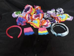 lot 24 image: Lot of scrunchies couple headbands two pairs of socks