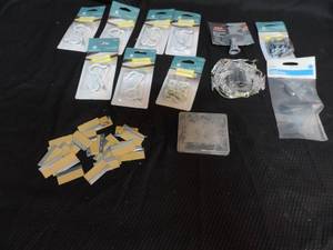 lot 26 image: Mixed lot hooks and  self  drilling drywall anchors and more