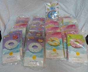 lot 32 image: 21 swim tubes and one beach ball
