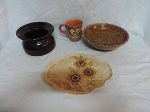 lot 48 image: Wood bowl  with like a macrame around it sunflower plate coffee cup and a spitoon
