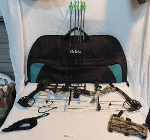 lot 51 image: Diamond by bow tech Infinite edge pro comes with a cabela case  arm gard and bow release and some practice arrows has aftermarket string on it