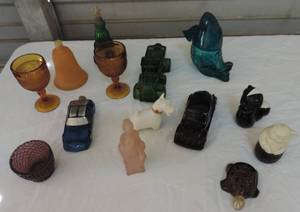 lot 85 image: Mixed lot of Avon perfume bottles couple Amber cups and a small purple vase