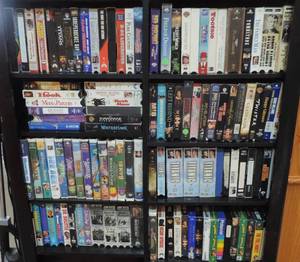lot 86 image: All VHSs in picture  shelf not included