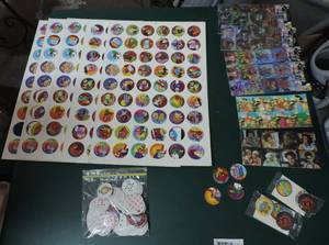 lot 103 image: Lot of pogs