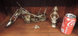 lot 111 image: Metal figures motorcycle and metal lady small motorcycle pin