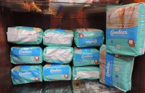 lot 120 image: Comfees 4t-5t pull ups 19 in each pack there is 11 packs