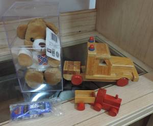 lot 131 image: Wood trucks small car teddy bear in plastic case