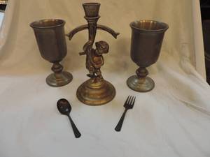 lot 168 image: Heavy metal candle holder and cups fork and spoon believe they may be brass