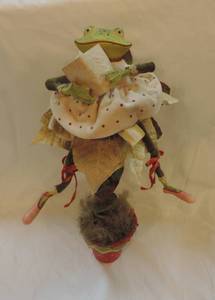 lot 174 image: Frog poinsettia flower