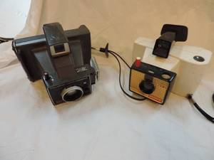 lot 175 image: polaroid land camera souare shooter  vintage 1960s polaroid land camera swinger model 20w