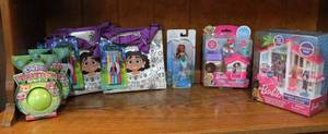 lot 181 image: Mix lot of toys some Barbie things purses with colors and other see picture