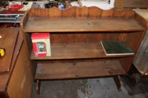 lot 189 image: Wood shelf approximately 42 inch tall and 44 inches wide and above 11 inches deep also comes with the few things on it