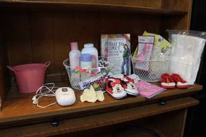 lot 199 image: Baby lot has a baby heartbeat monitor lotion powders book baby on board sign cloth diapers burp rags nipples and more