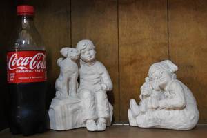 lot 213 image: Hand made little boy with dog and little girl with dog