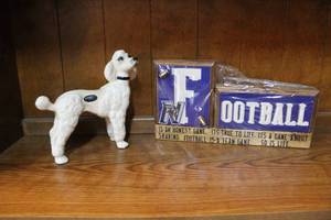 lot 234 image: Porcelain poodle and wood  football sign