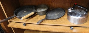 lot 260 image: Cast iron pans and a tea kettle