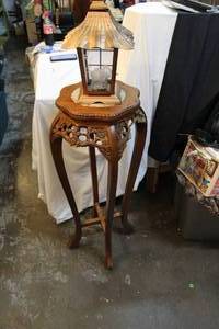 lot 316 image: Table and candle lantern table has a small break in the back as seen in pictures