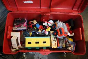 lot 328 image: Plastic red chest full of previous love toys