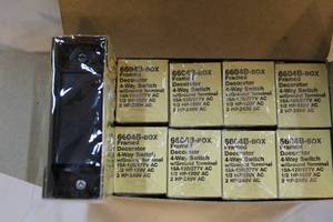 lot 339 image: 9-Frame decorator four-way switch with ground terminal