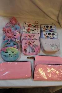 lot 365 image: Change purses and three pencil bags