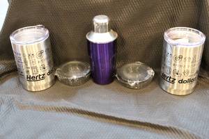 lot 376 image: 11 inch stainless steel tumbler beer kooziesand a small shaker