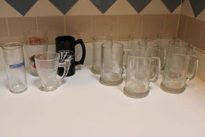 lot 33 image: Glassware souvenir steins and glasses