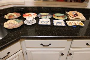 lot 42 image: Decorative plates with Norman Rockwell Christmas plate