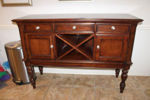 lot 52 image: Buffet cabinet with center wine rack