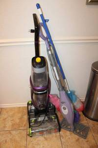 lot 55 image: Bissell Pet Pro vacuum cleaner, Shark mop and dusters