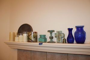 lot 78 image: Home dcor blue glass vases, LED candles and more