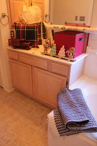 lot 89 image: Christmas stocking holders, ornaments, wooden truck, pillows and rug