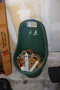 lot 130 image: Extension cords and rolling garden bin