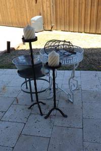 lot 103 image: Metal patio stands, iron candle stands, and galvanized tub