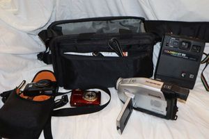 lot 64 image: Cameras and video camera