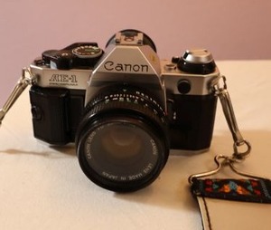 lot 65 image: Canon camera and lenses