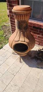 lot 98 image: Chiminea fire pit with fire wood
