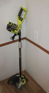 lot 3 image: Ryobi 24V weed eateredger with Charger, NO BATTERY