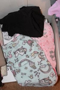 lot 39 image: Pink Baby Blanket, Sleep Sack and Stretch Baby Wrap Similar to a Moby or Boba Wrap